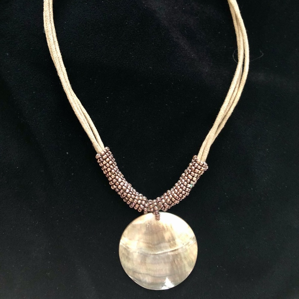 Gorgeous Brown Shell on brown rope necklace. Made by Lia Sophia.